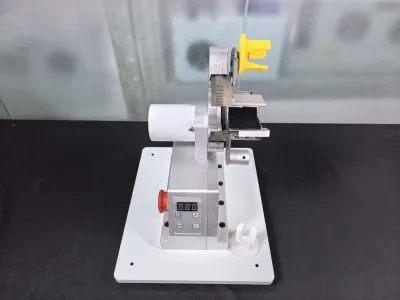 Máy cuộn vải dọc JW-25W Thumb